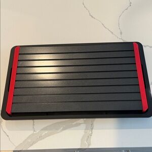 Unbranded defrosting tray